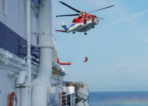 providing emergency rescue and medical aid to an injured seaman on a ship’s deck