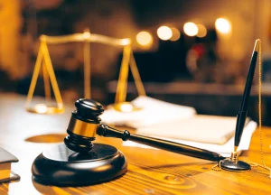 Court gavel and maritime charts representing wrongful death law at sea